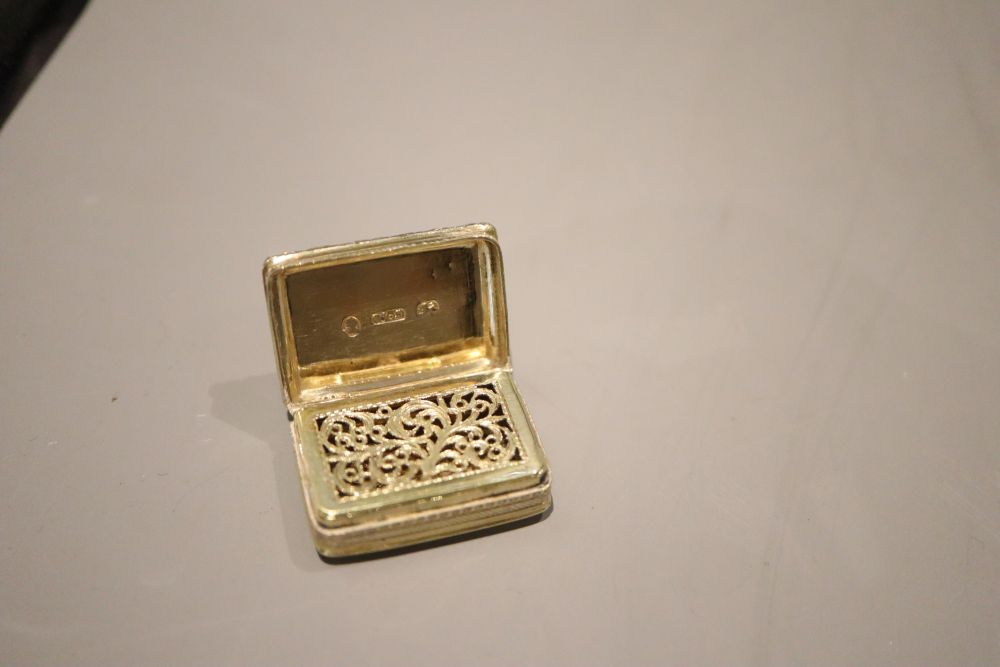 A George III silver gilt vinaigrette, William Simpson, Birmingham, 1826, 28mm.